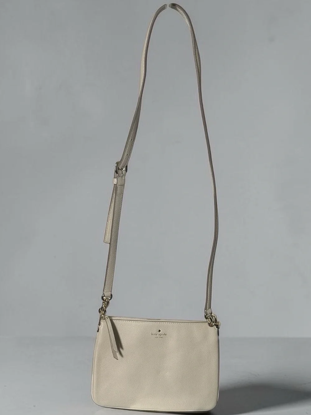 kate spade Pebbled Leather Crossbody Bag in Light Beige